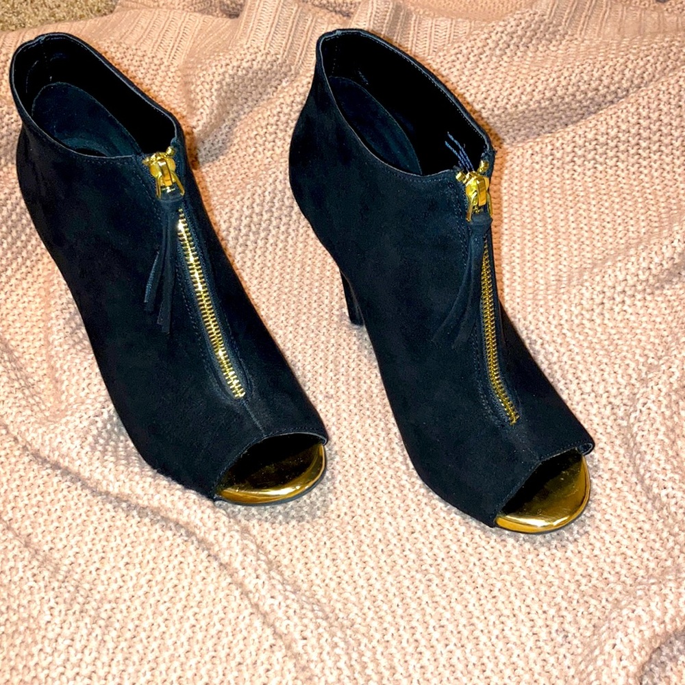 Black and Gold zip up heals